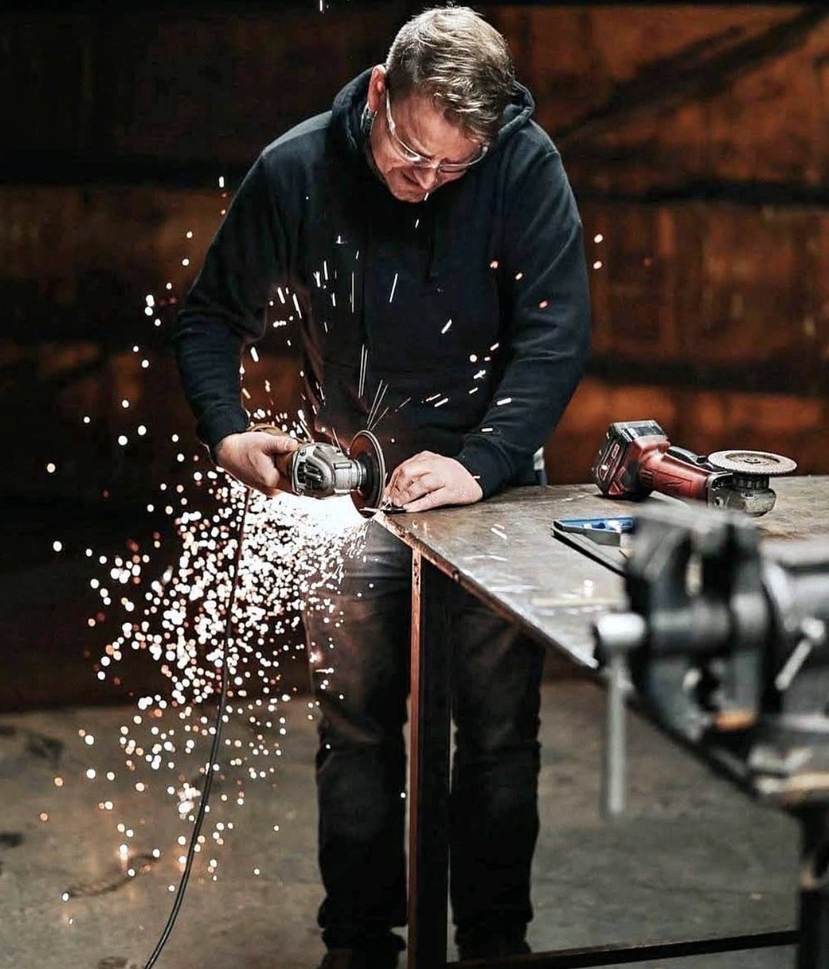Grinding a part with sparks flying